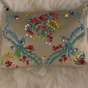 Eco-Friendly Gold Multicolored Grommet Clutch